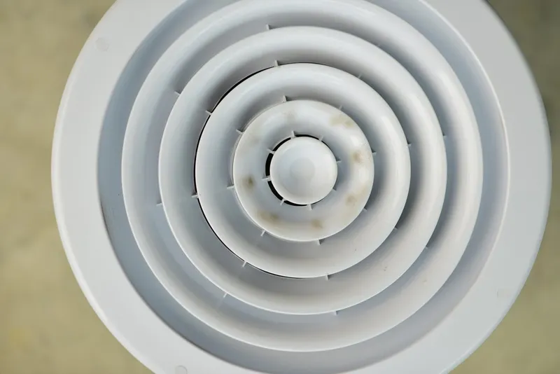 Ceiling air vent with dust marks