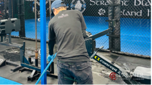 Professional gym deep cleaning team disinfecting gym equipment, mats, benches and changing room surfaces to help prevent skin infections in a Dublin fitness centre.